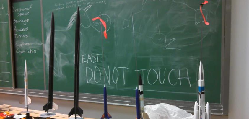 Photo of small, handcrafted rockets